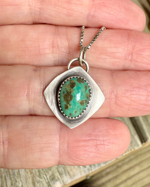 Turquoise Mountain silver pendant