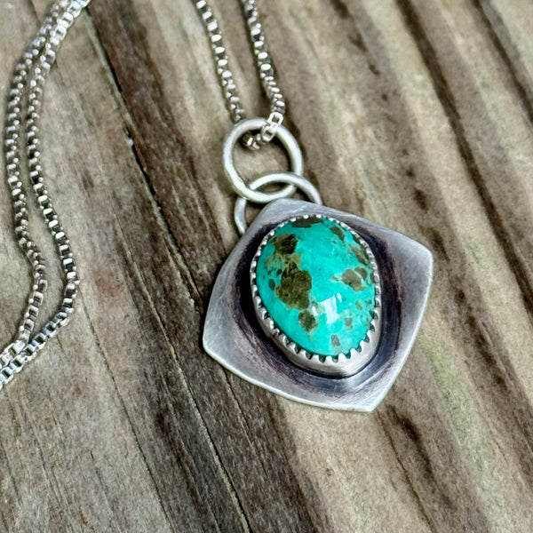 Turquoise Mountain silver pendant