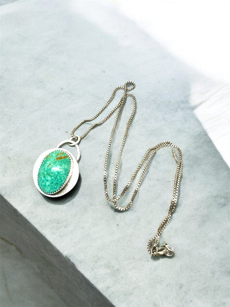 Turquoise Mountain silver pendant