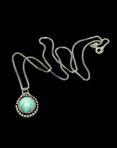 Turquoise Mountain silver pendant