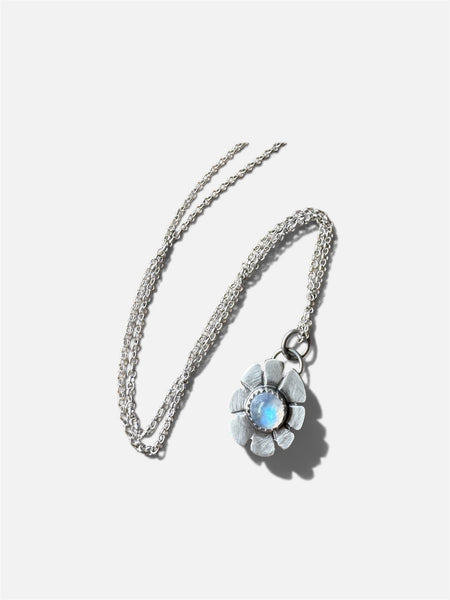 Tiny moonstone flower pendant