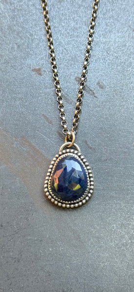 Blue sapphire and sterling pendant