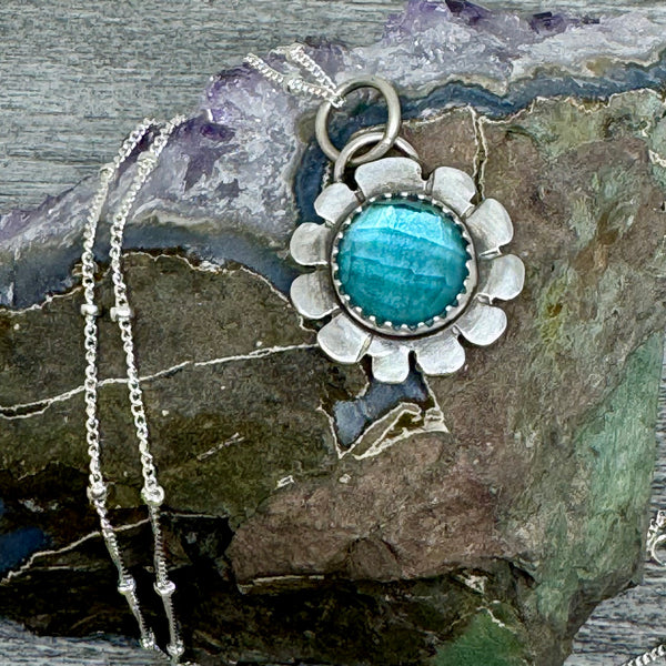 Blue topaz flower pendant