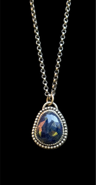 Blue sapphire and sterling pendant