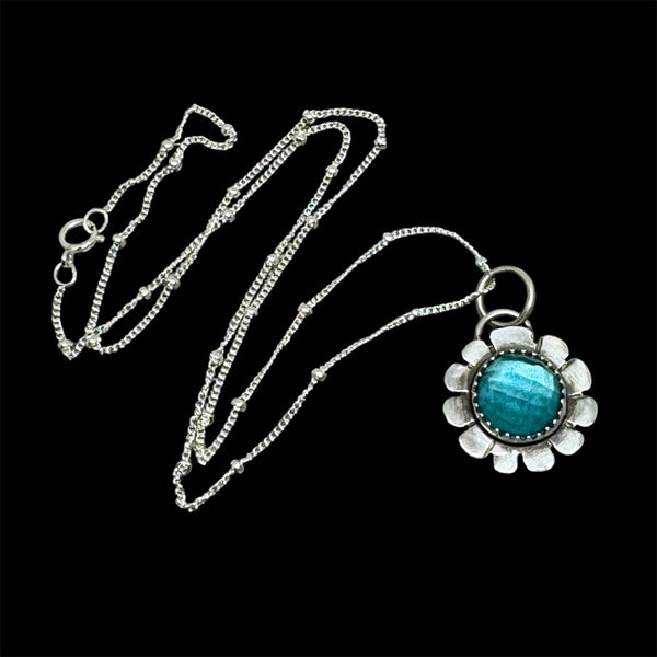 Blue topaz flower pendant