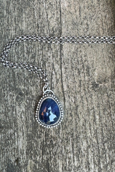 Blue sapphire and sterling pendant