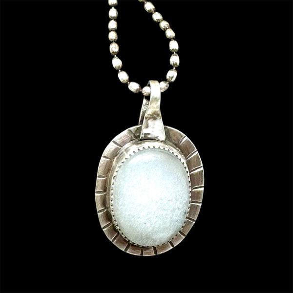 Ice moonstone and silver pendant