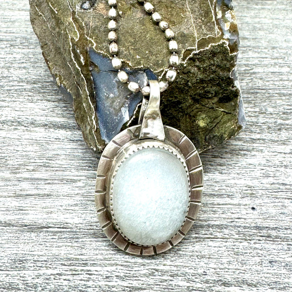 Ice moonstone and silver pendant