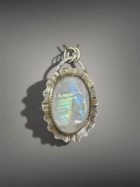 Rainbow moonstone and silver pendant