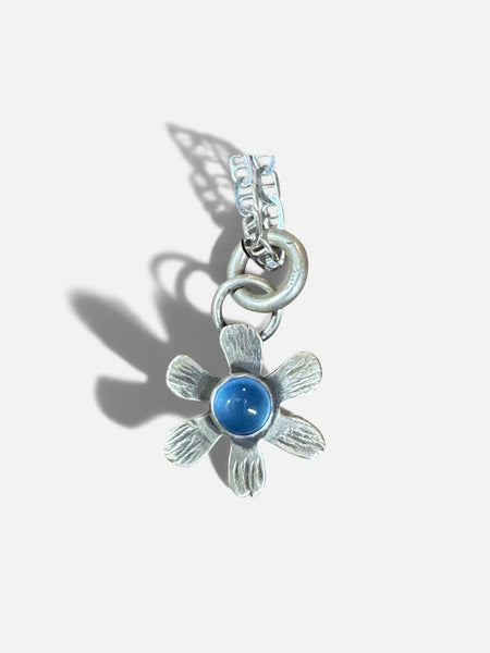 Tiny pink sapphire flower (blue chalcedony) pendant