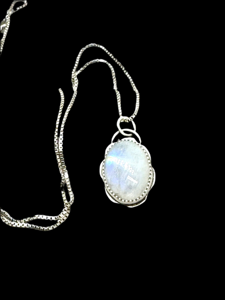 Rainbow moonstone and silver pendant