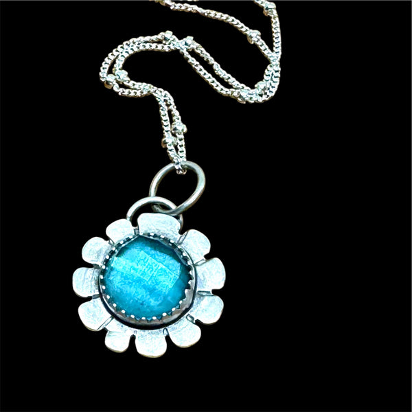 Blue topaz flower pendant