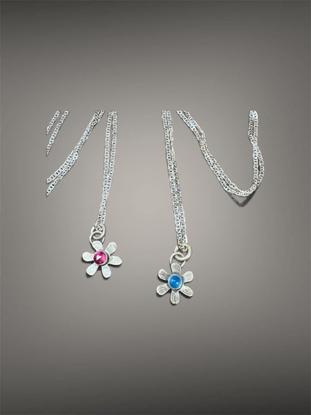 Tiny pink sapphire flower (blue chalcedony) pendant