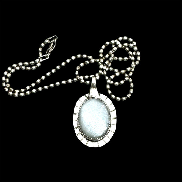 Ice moonstone and silver pendant