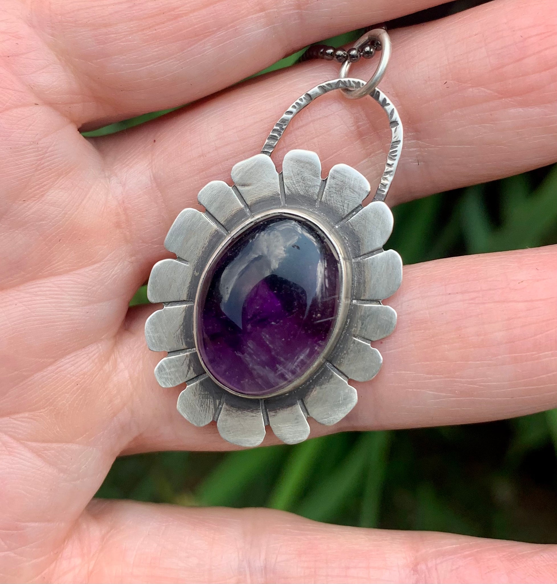 Amethyst and silver pendant