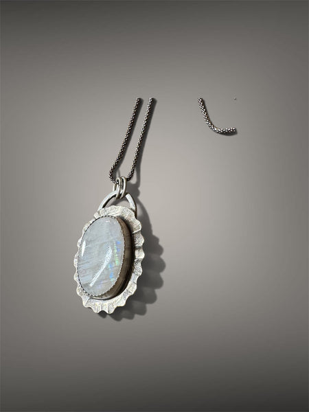 Rainbow moonstone and silver pendant
