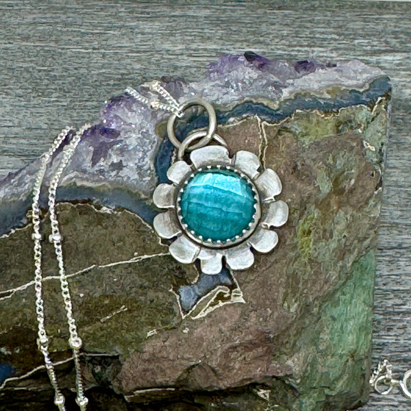 Blue topaz flower pendant