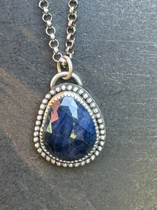 Blue sapphire and sterling pendant