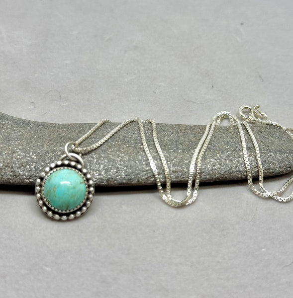 Turquoise Mountain silver pendant