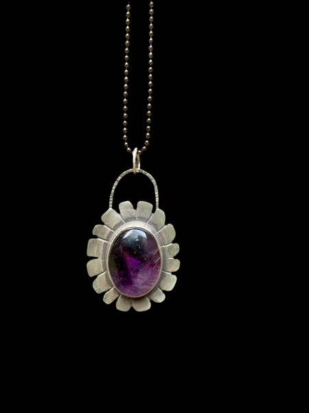 Amethyst and silver pendant