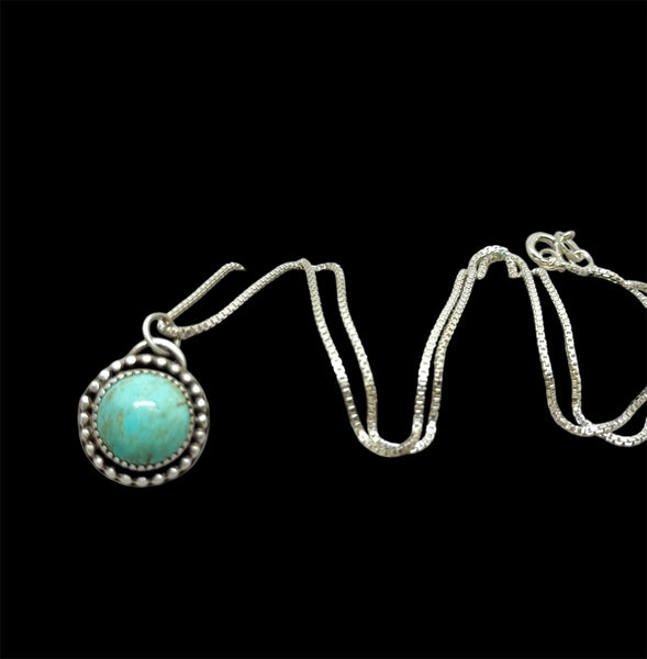 Turquoise Mountain silver pendant