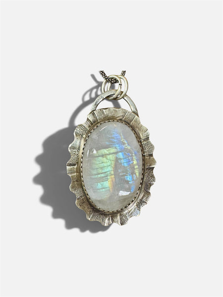 Rainbow moonstone and silver pendant