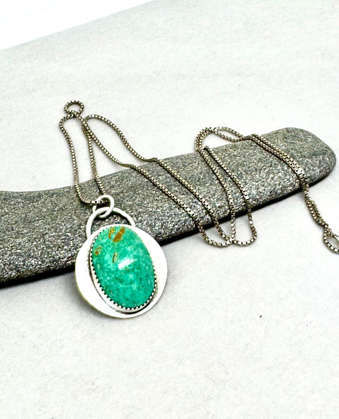 Turquoise Mountain silver pendant