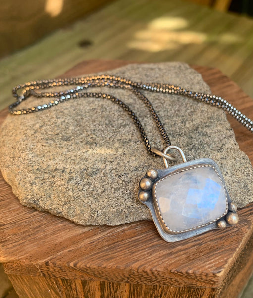 Rainbow moonstone and silver pendant