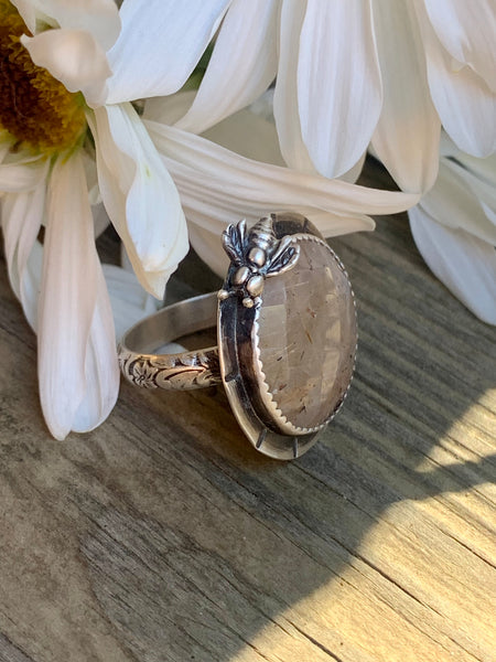 Golden rutilated quartz and silver ring
