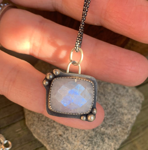 Rainbow moonstone and silver pendant